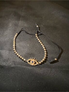 Evil Eye Beaded Bracelet in Gold tone and Black cord adjustable